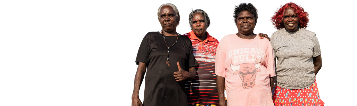 Four women looking straight ahead at the camera